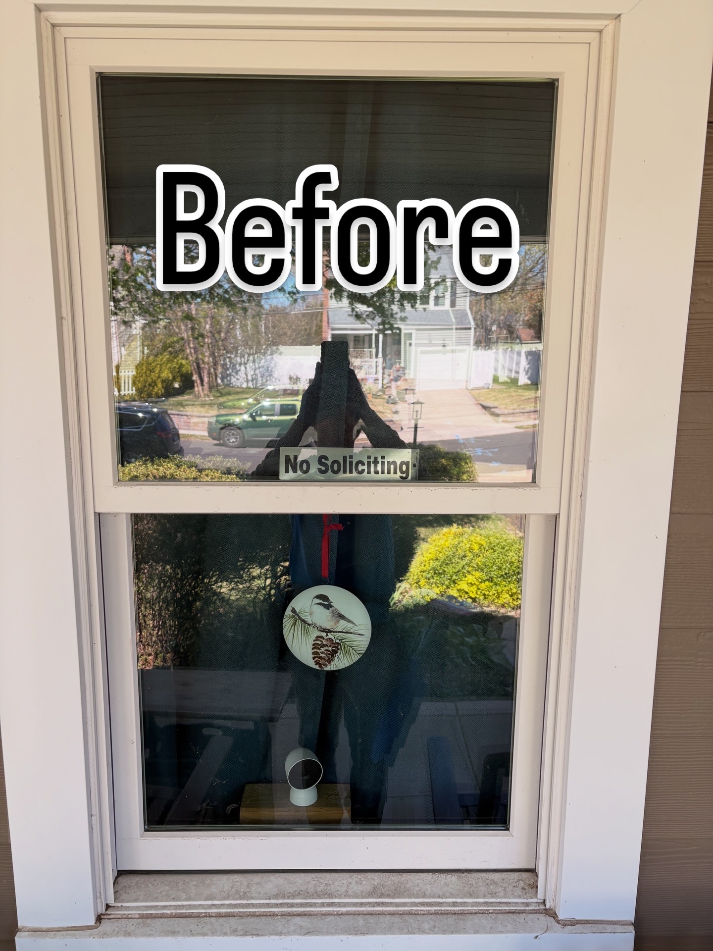 Front door glass before cleaning